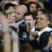 President Obama greets supporters after giving a speech on education at the Al Glick Fieldhouse on Friday morning.  Melanie Maxwell I AnnArbor.com